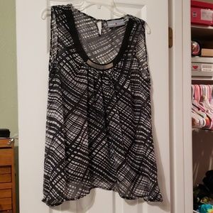 Black and white sheer sleeveless top